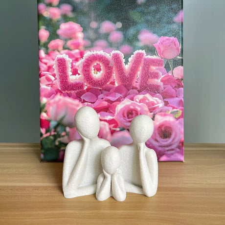 A family decorated wedding statue for three people, perfect as an anniversary gift for husband and wife, newlyweds, or as an art